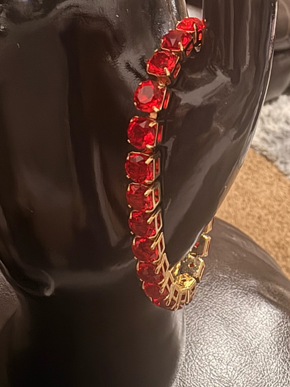 Gold Toned bracelet with Red Crystal Stones
